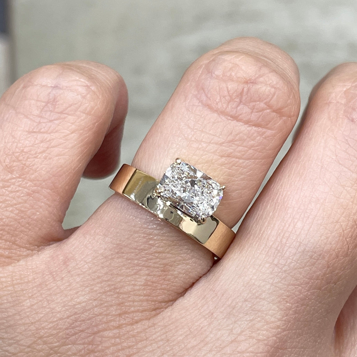 IGI Lab diamond long cushion shape 1.5ct four-prong horizontal top setting thick flat band ring