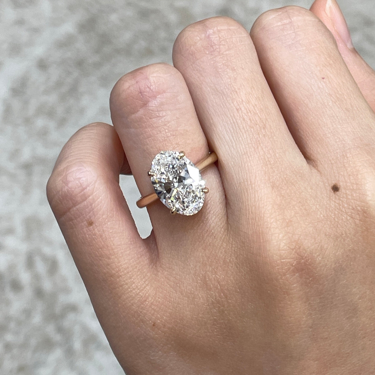IGI Lab diamond Oval 3.5ct four-prong underhalo ring
