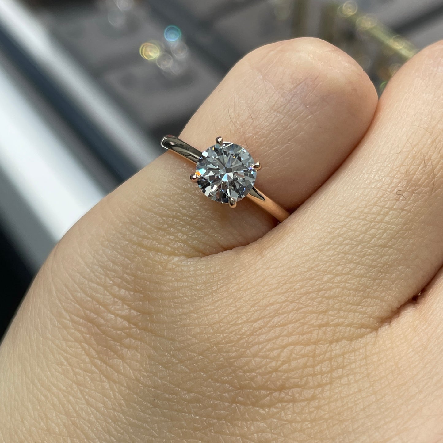 IGI lab diamond 1ct round four-prong underhalo ring