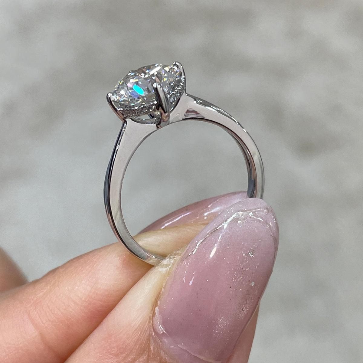 IGI Lab diamond Round 2ct compass four-prong underhalo criss cross band ring