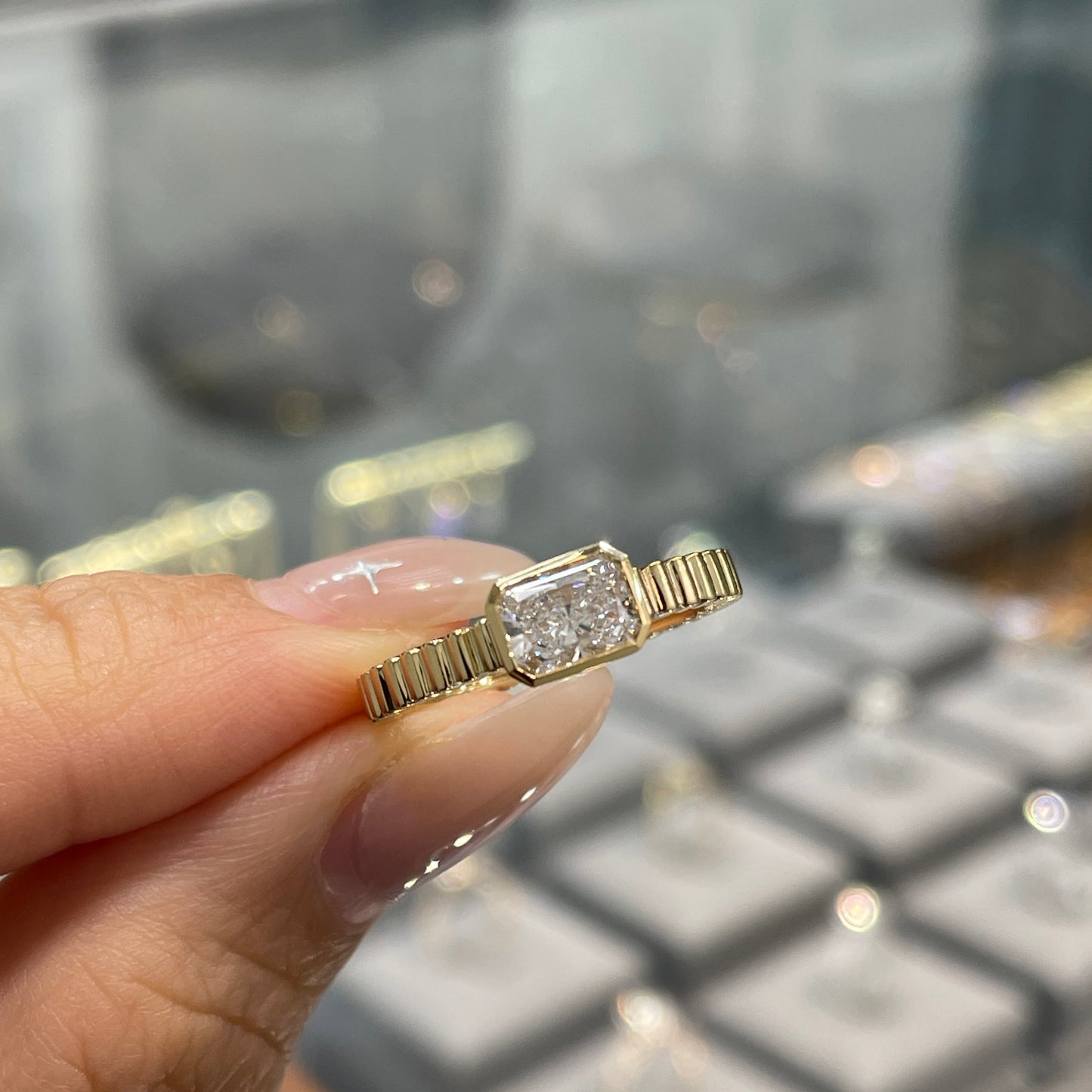 Lab diamond Radiant cut 0.6ct horizontal bezel set with vertical line band ring