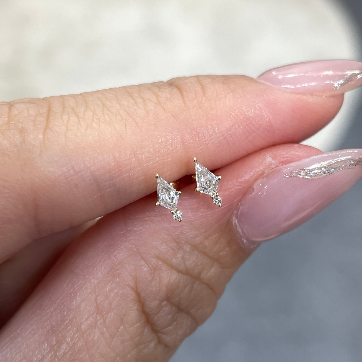 Lab diamond kite and round 0.09ct stud earring - each
