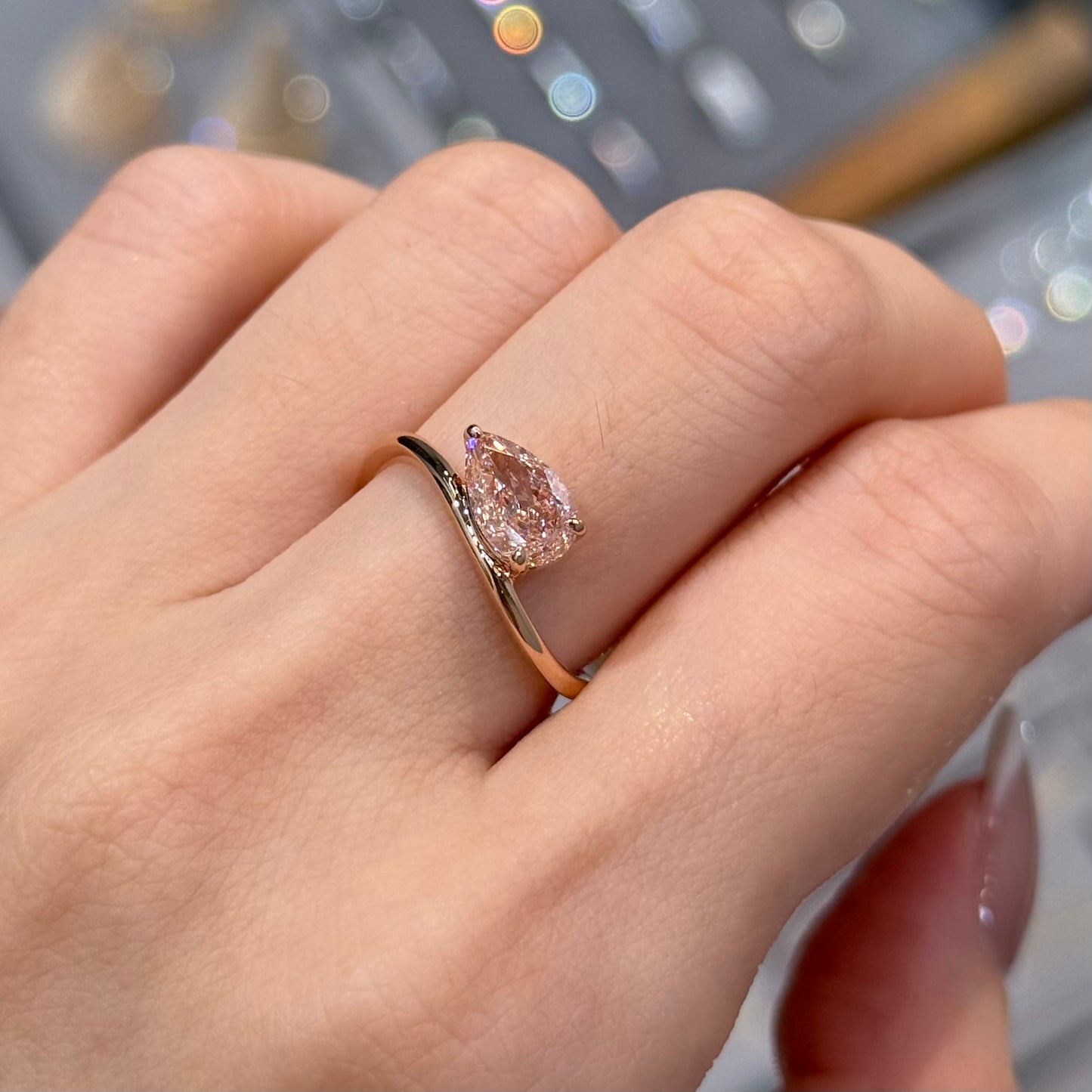 IGI lab pink diamind pear shape 1ct three-prong wavy ring