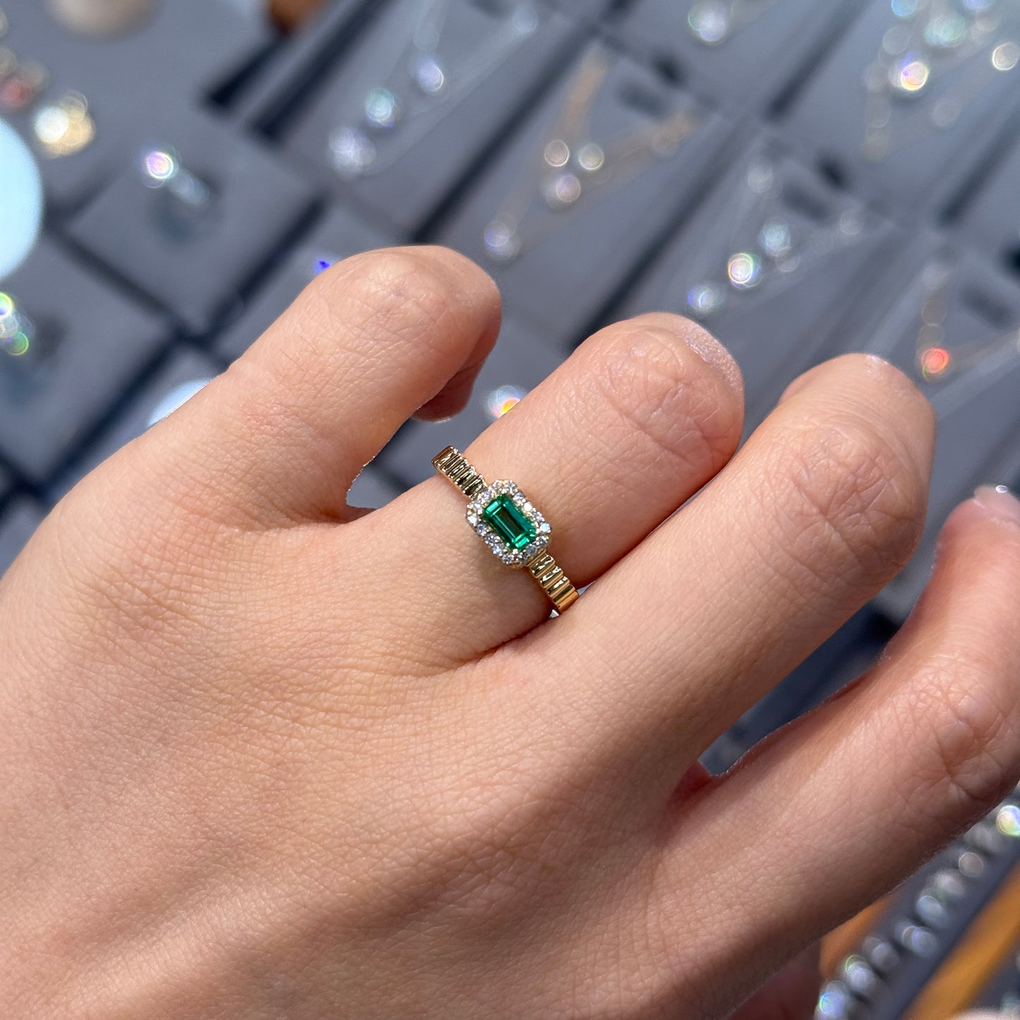 Lab Emerald emerald cut 0.25ct halo set with vertical line band ring