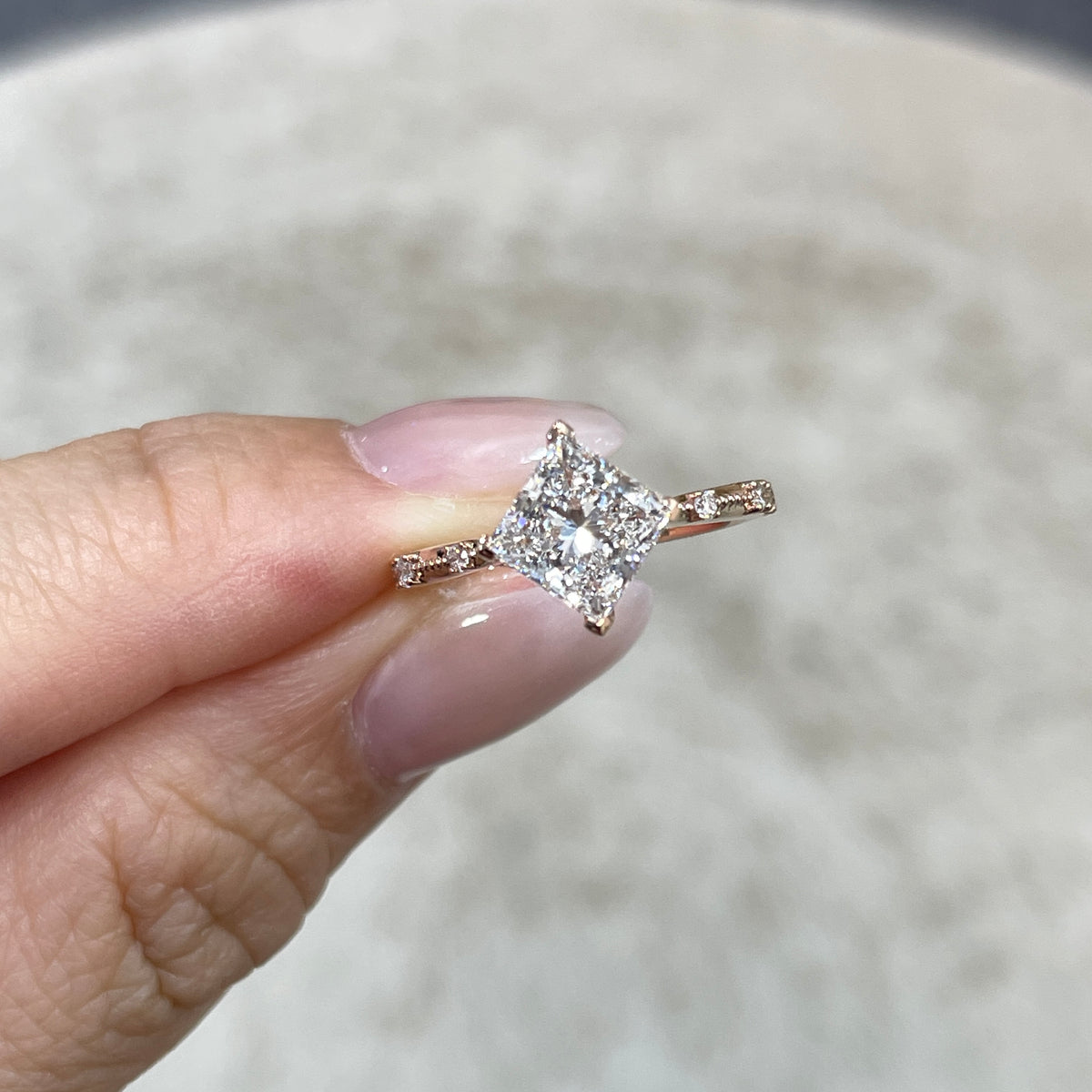 IGI Lab diamond Princess cut 1.5ct four-prong milgrain side stone band ring