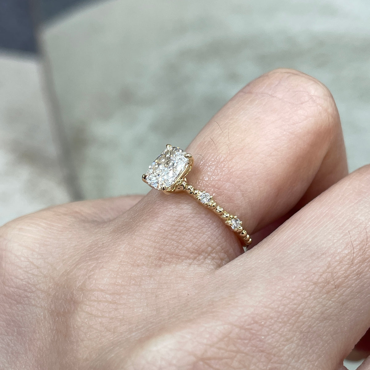 IGI Lab Diamond long cushion 1ct four-prong side stone with milgrain band ring
