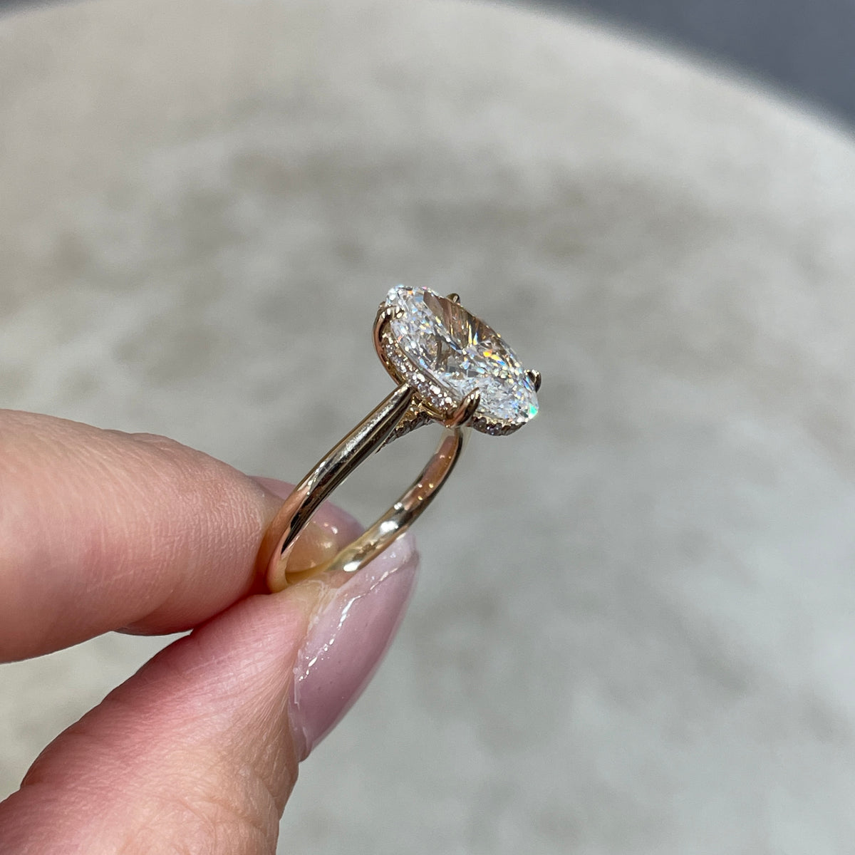 IGI Lab diamond Oval 3.5ct four-prong underhalo ring