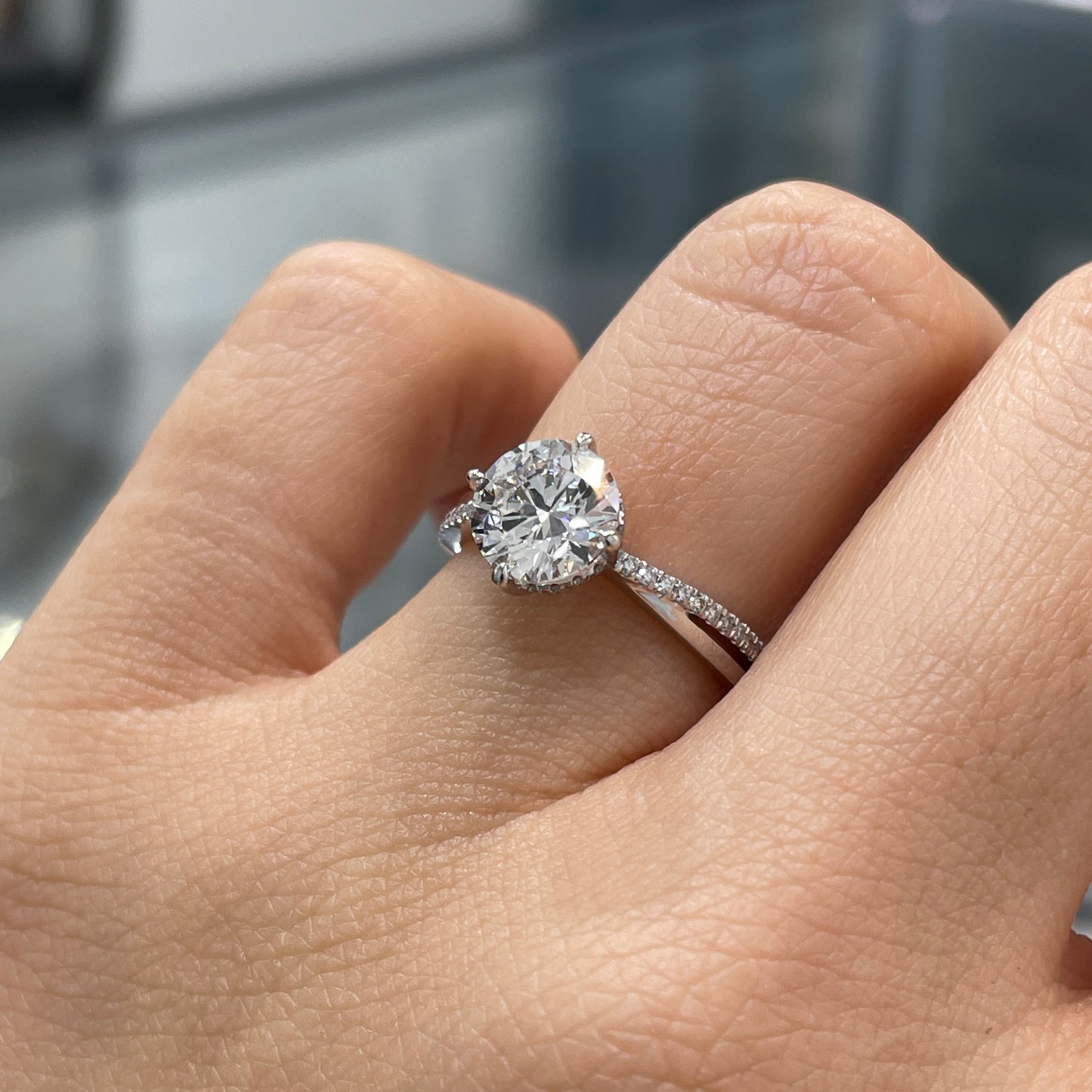 IGI Lab diamond Round 1.5ct compass four-prong underhalo criss cross pave band ring