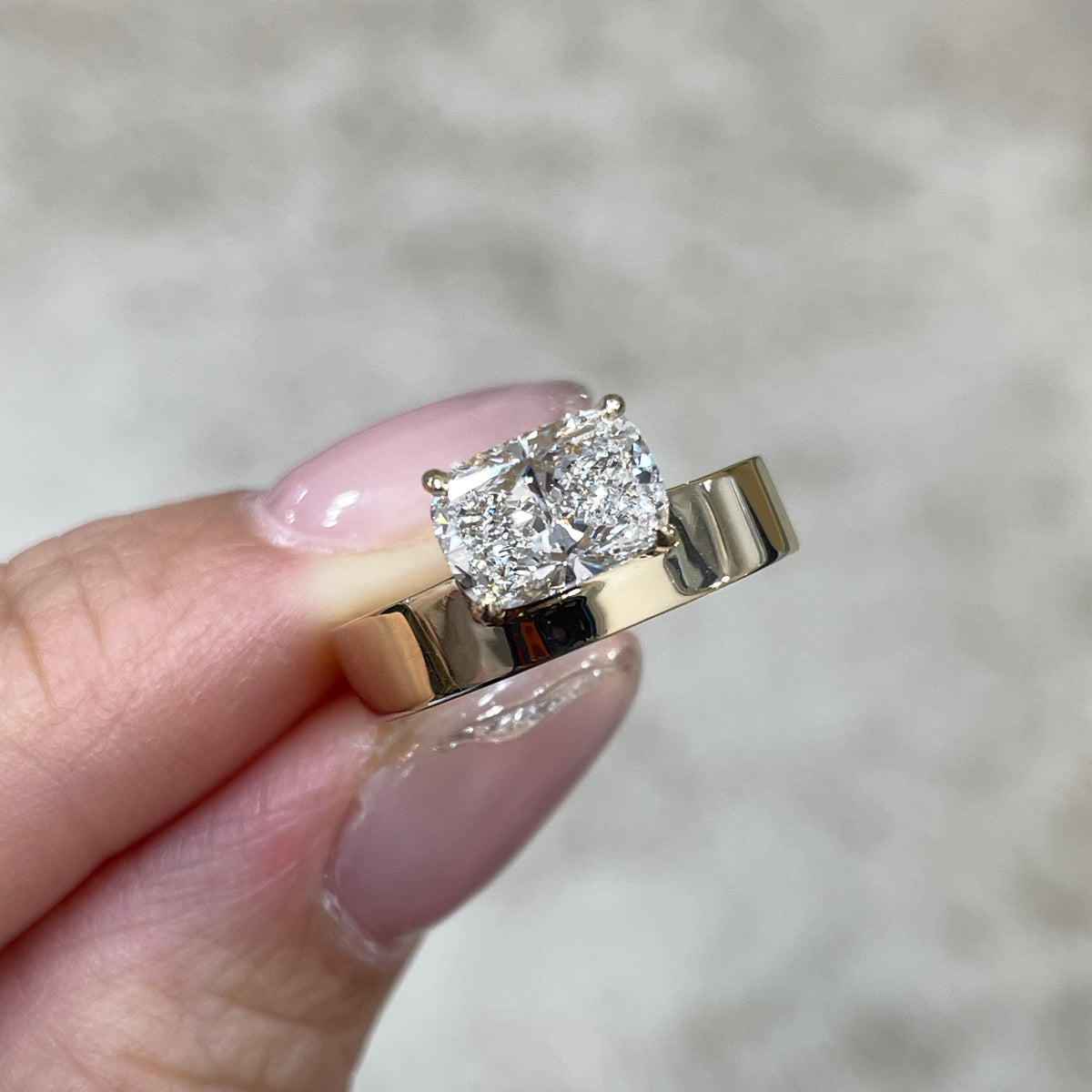 IGI Lab diamond long cushion shape 1.5ct four-prong horizontal top setting thick flat band ring