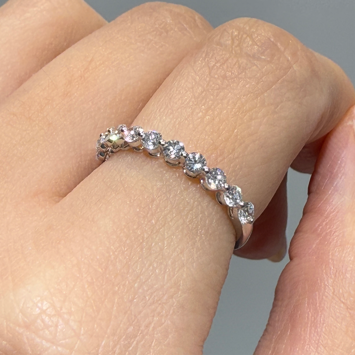 Lab diamond round 0.6ct single prong half eternity ring