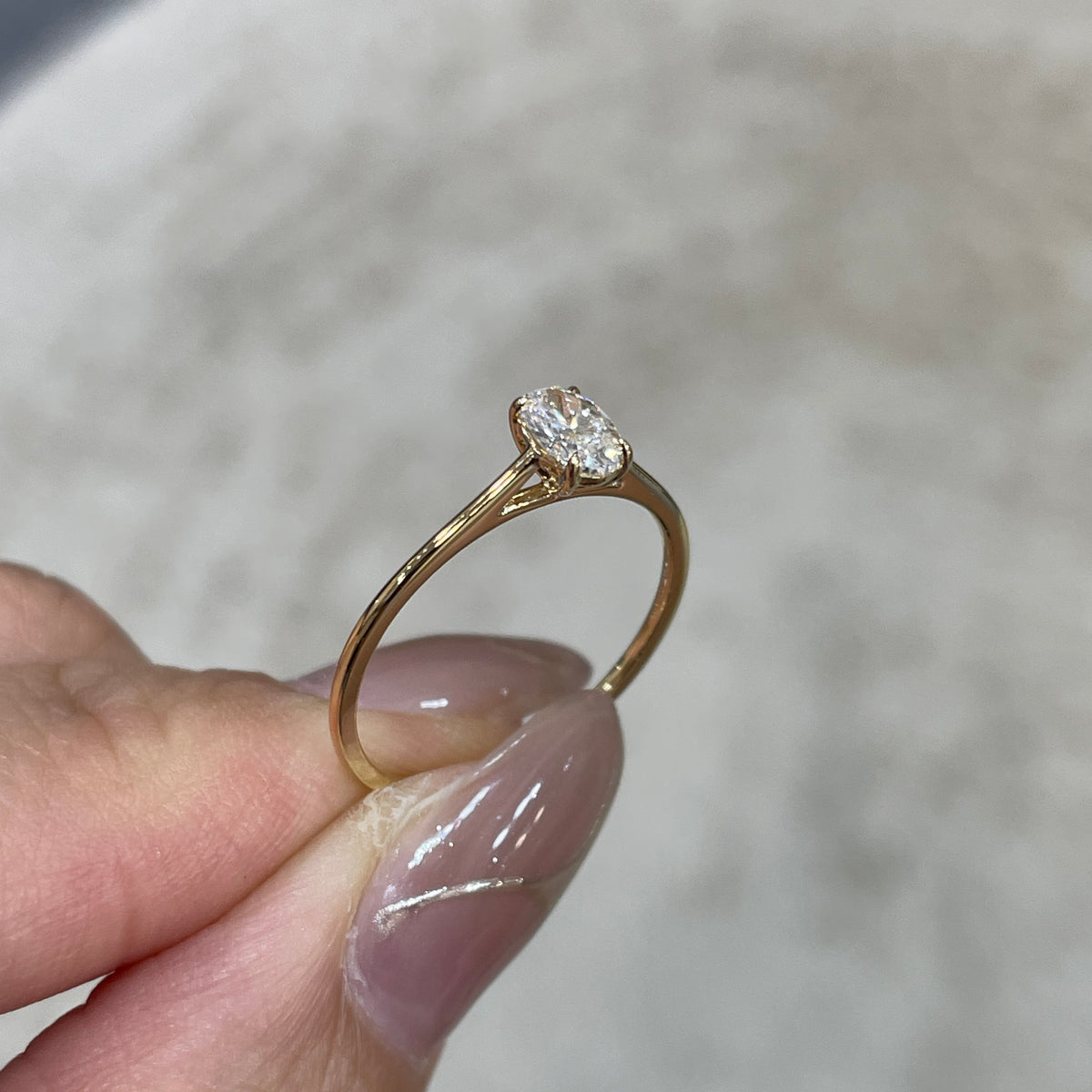 Lab diamond oval shape 0.3ct four-prong solitaire ring