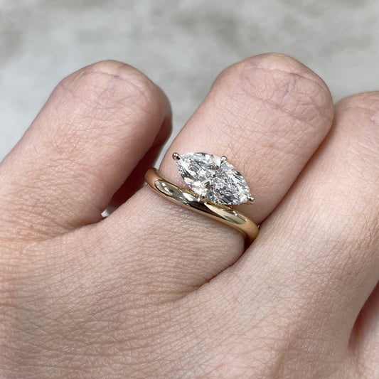 IGI Lab diamond marquise shape 1.35ct compass four-prong wavy ring