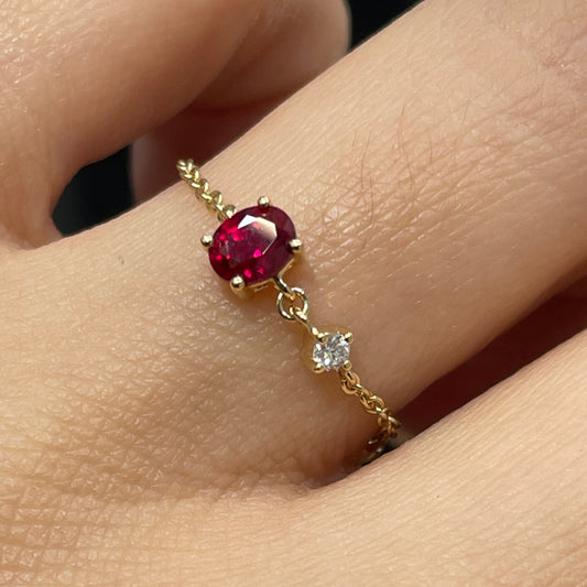 Lab Ruby oval shape 0.4ct with little diamond chain ring