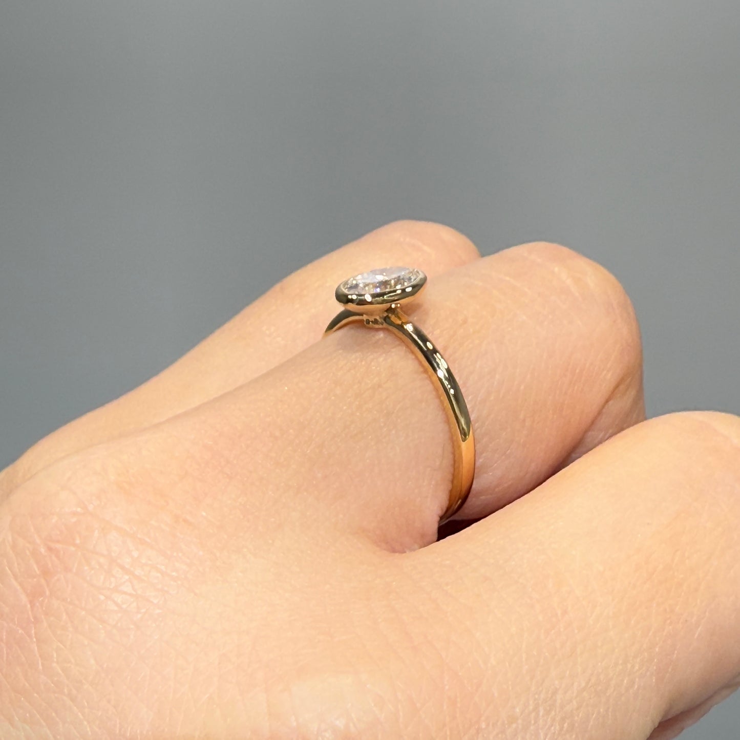 Lab diamond oval 0.7ct bezel ring