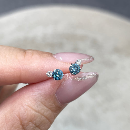 Lab blue diamond round 0.42ct toi et moi stud earrings - pair
