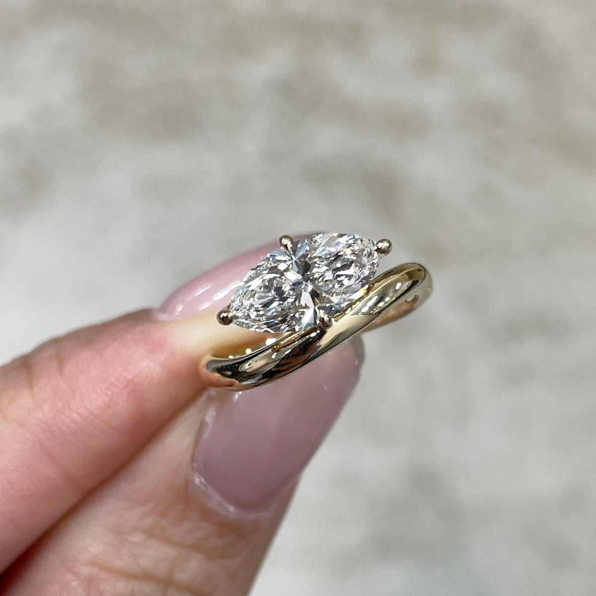 9k IGI Lab diamond marquise shape 1.35ct compass four-prong wavy ring