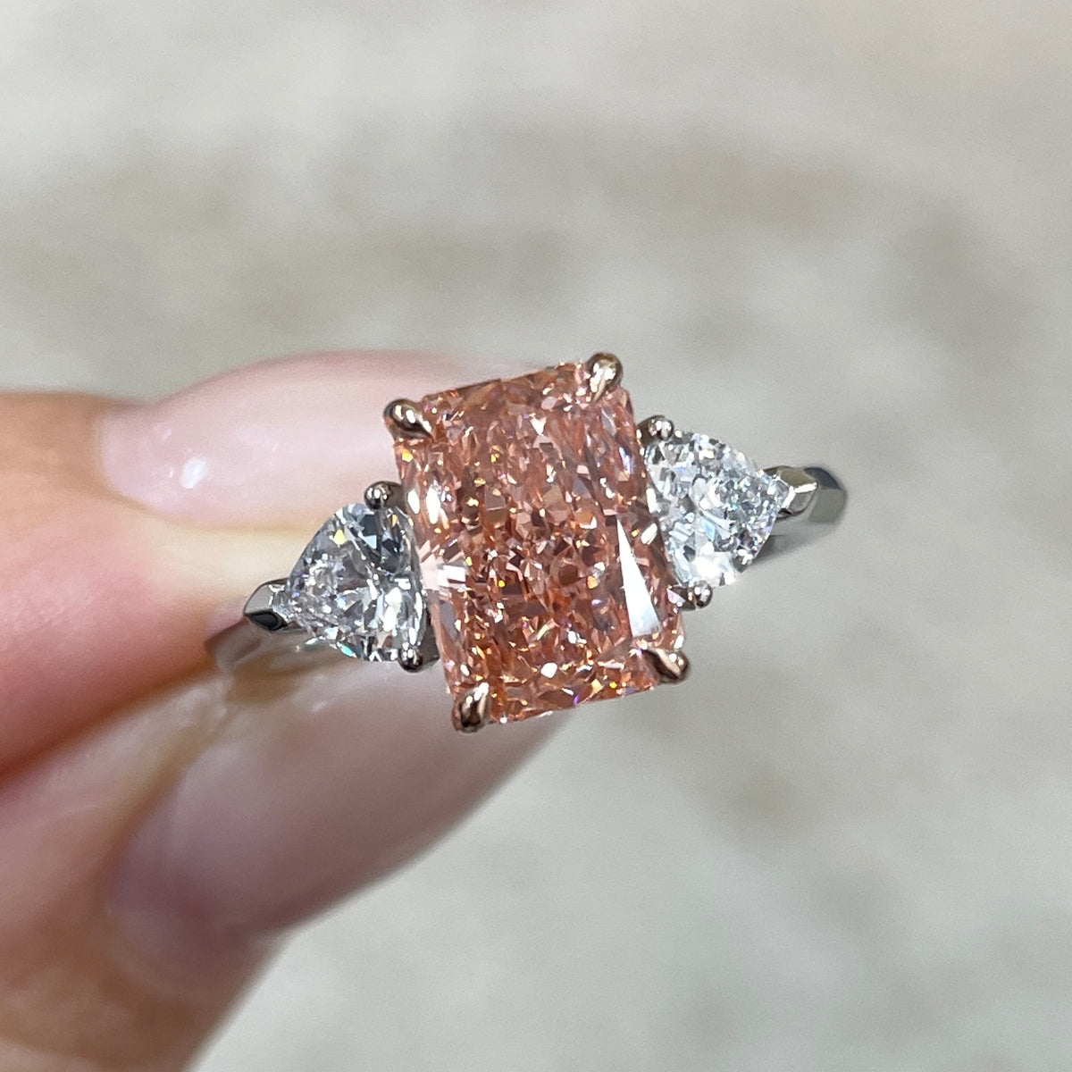 IGI pink diamond radiant 2ct with heart 0.5ct three stone setting two tone ring