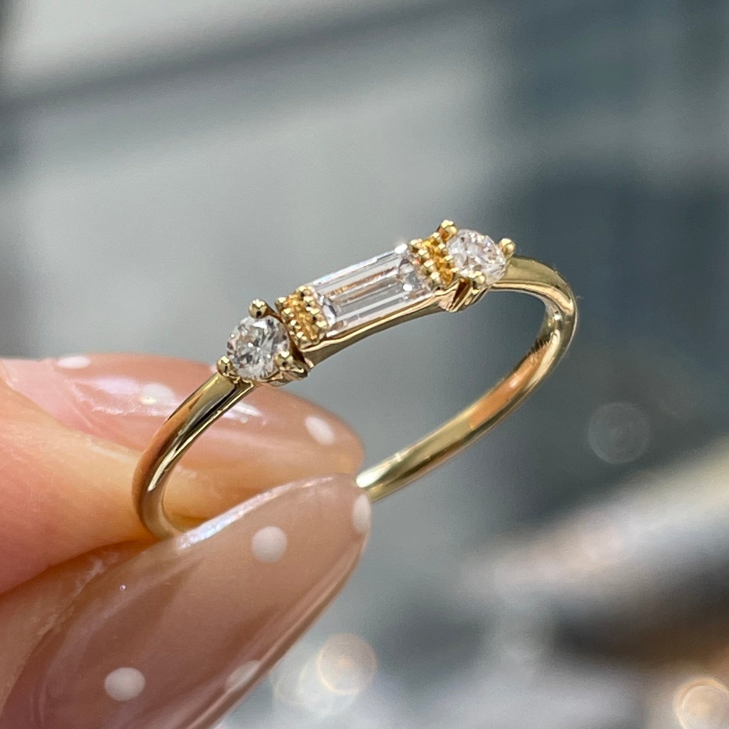 Lab diamond baguette and round ring