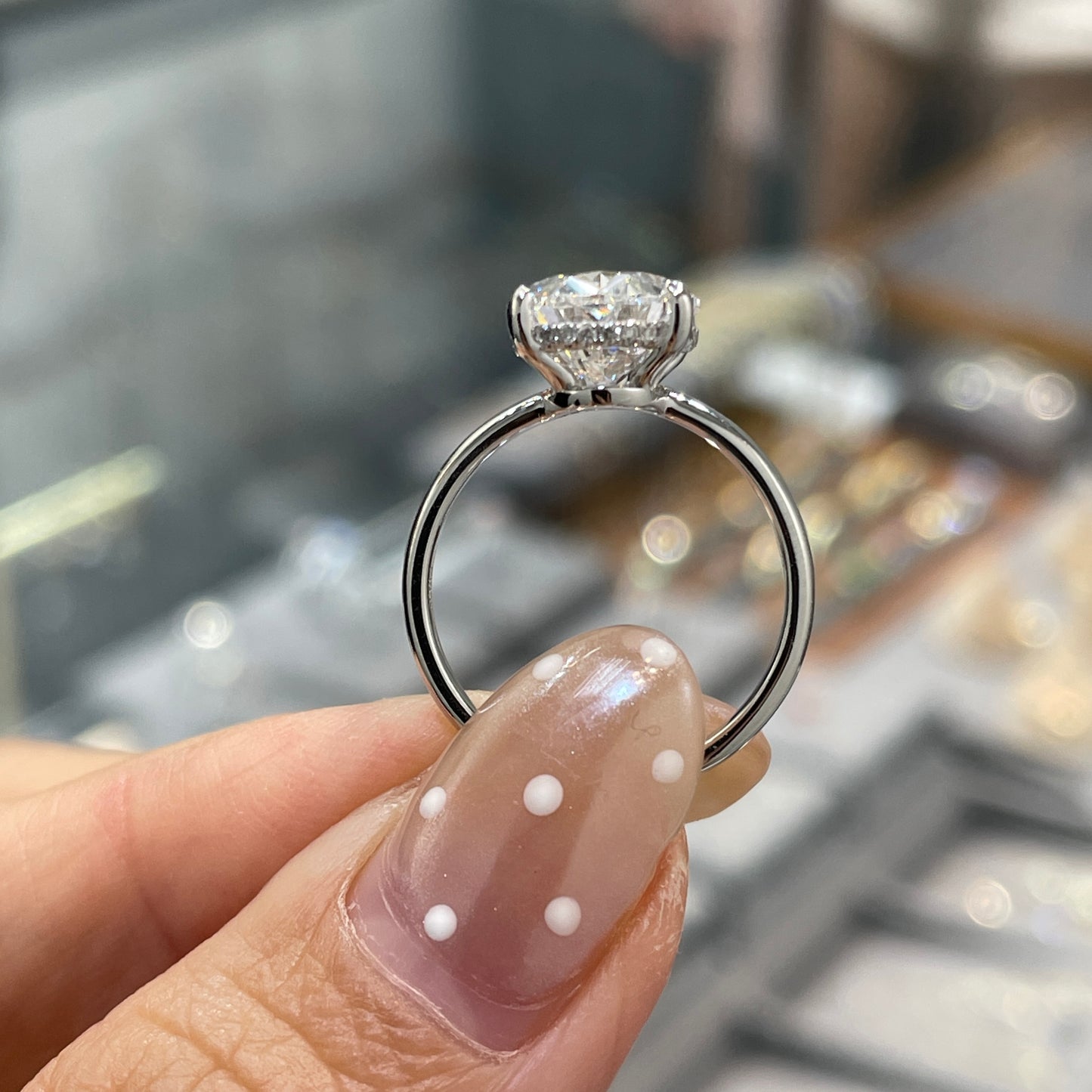 IGI lab diamond Oval 3.5ct four-prong underhalo ring