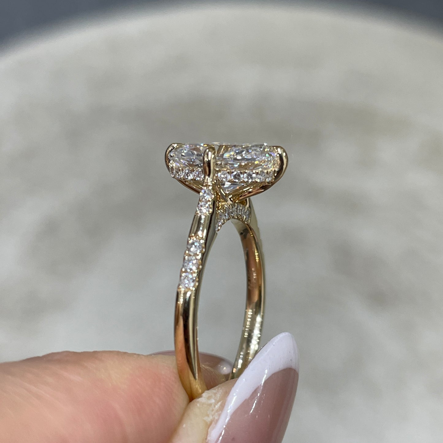 IGI Lab diamond long cushion cut 2.5ct four-prong compass underhalo side stone ring