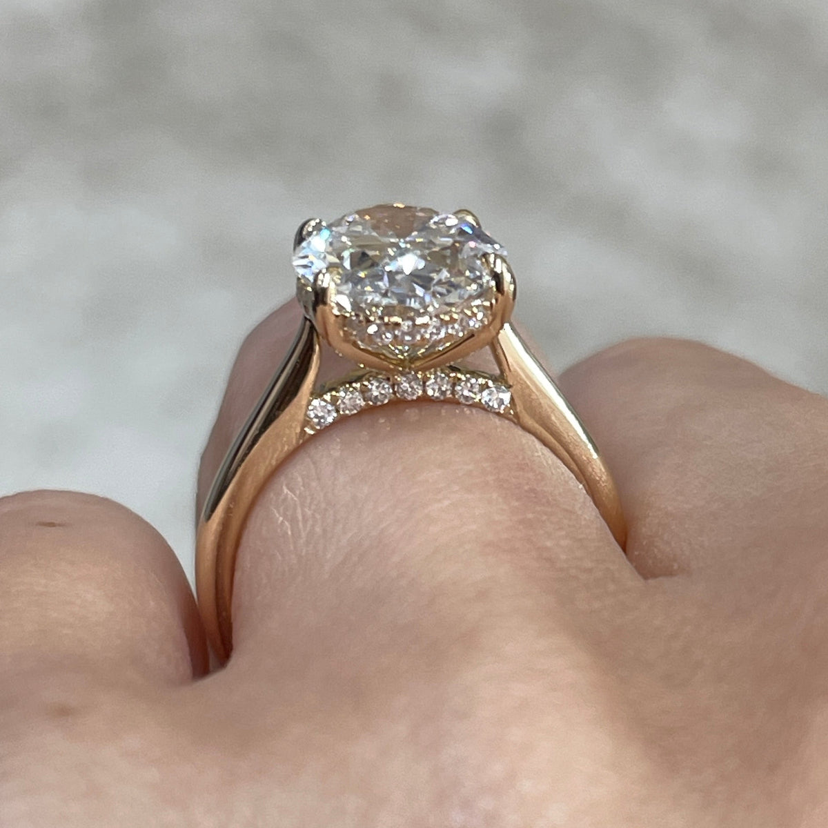 IGI Lab diamond Oval 3.5ct four-prong underhalo ring