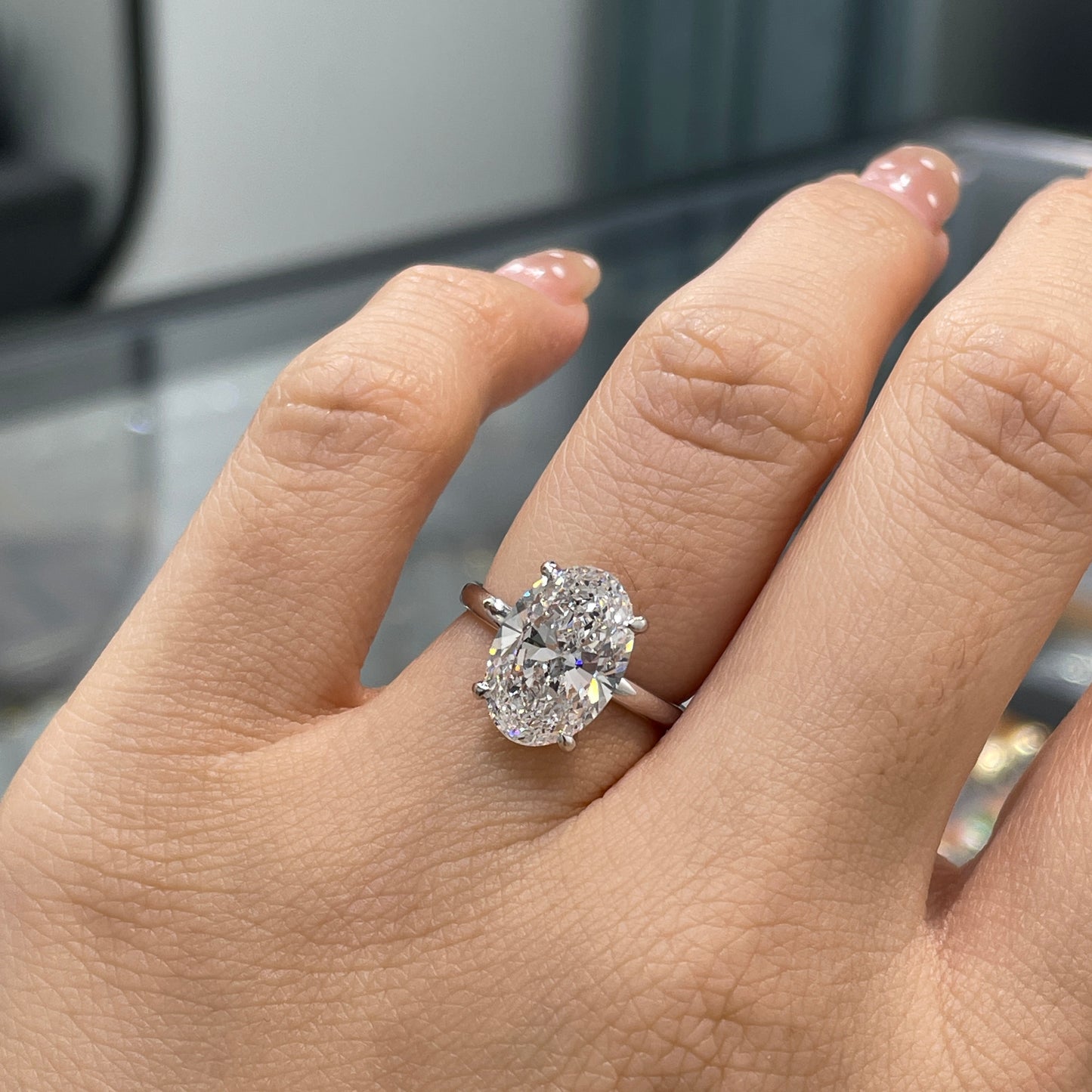IGI lab diamond Oval 3.5ct four-prong underhalo ring