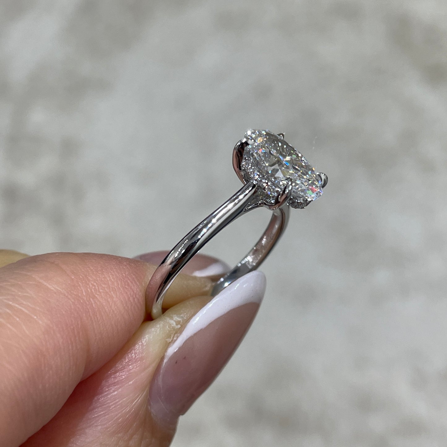 IGI Lab diamond Oval shape 2ct four-prong under halo ring