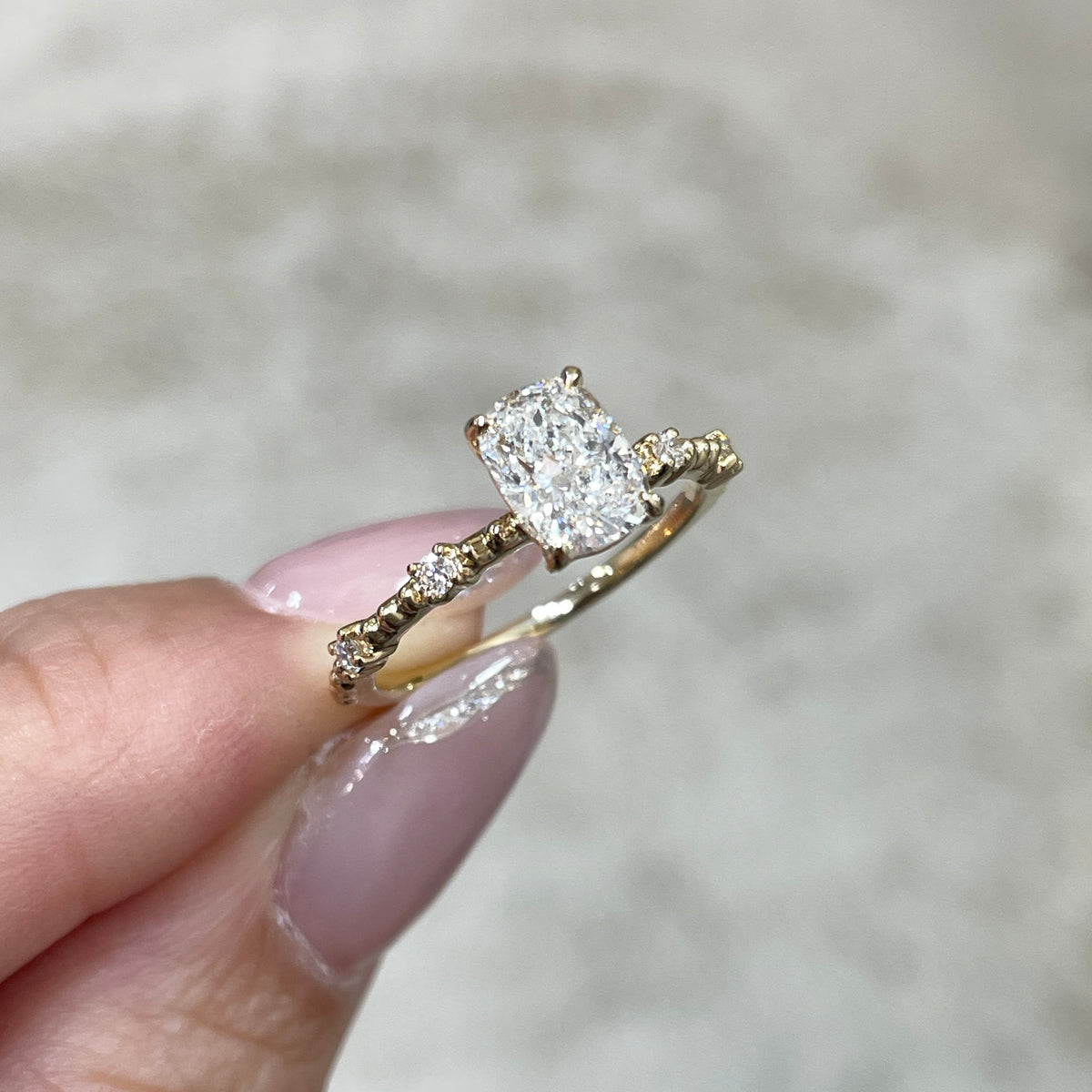 IGI Lab Diamond long cushion 1ct four-prong side stone with milgrain band ring