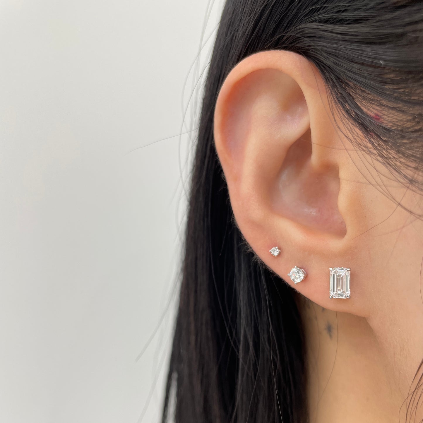 Lab diamond emerald cut 1.4ct four-prong stud earrings-pair