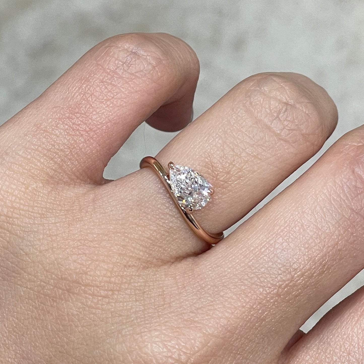 Lab diamond Pear shape 1ct three-prong wavy ring