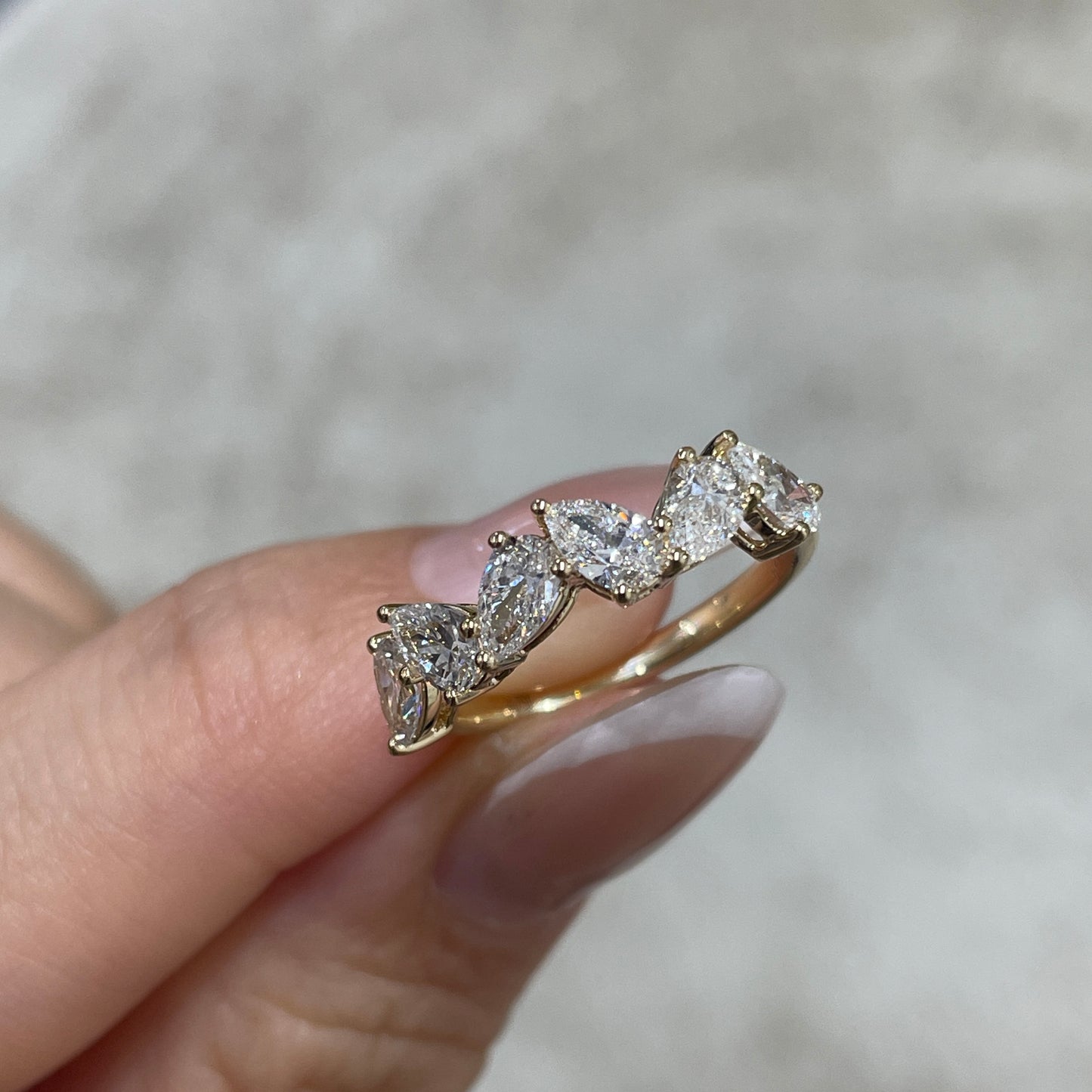 Lab diamond pear 1.2ct irregular half eternity ring