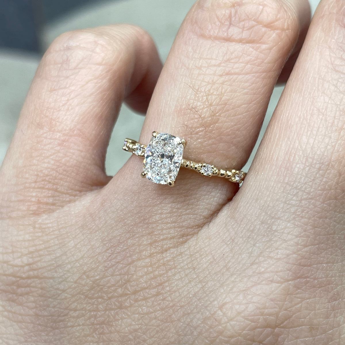 IGI Lab Diamond long cushion 1ct four-prong side stone with milgrain band ring
