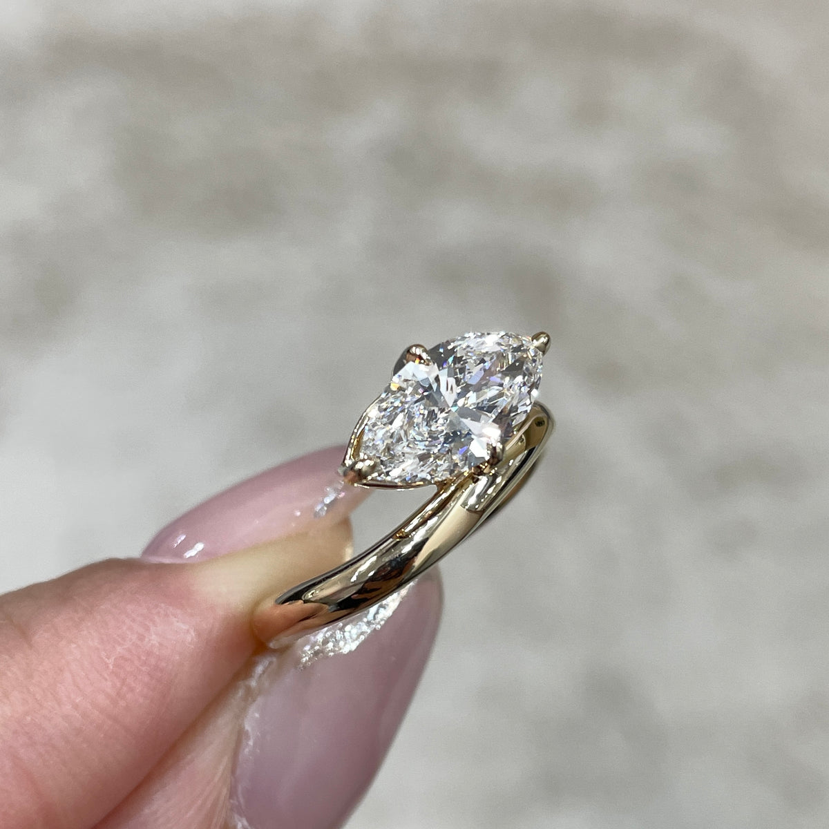 9k IGI Lab diamond marquise shape 1.35ct compass four-prong wavy ring