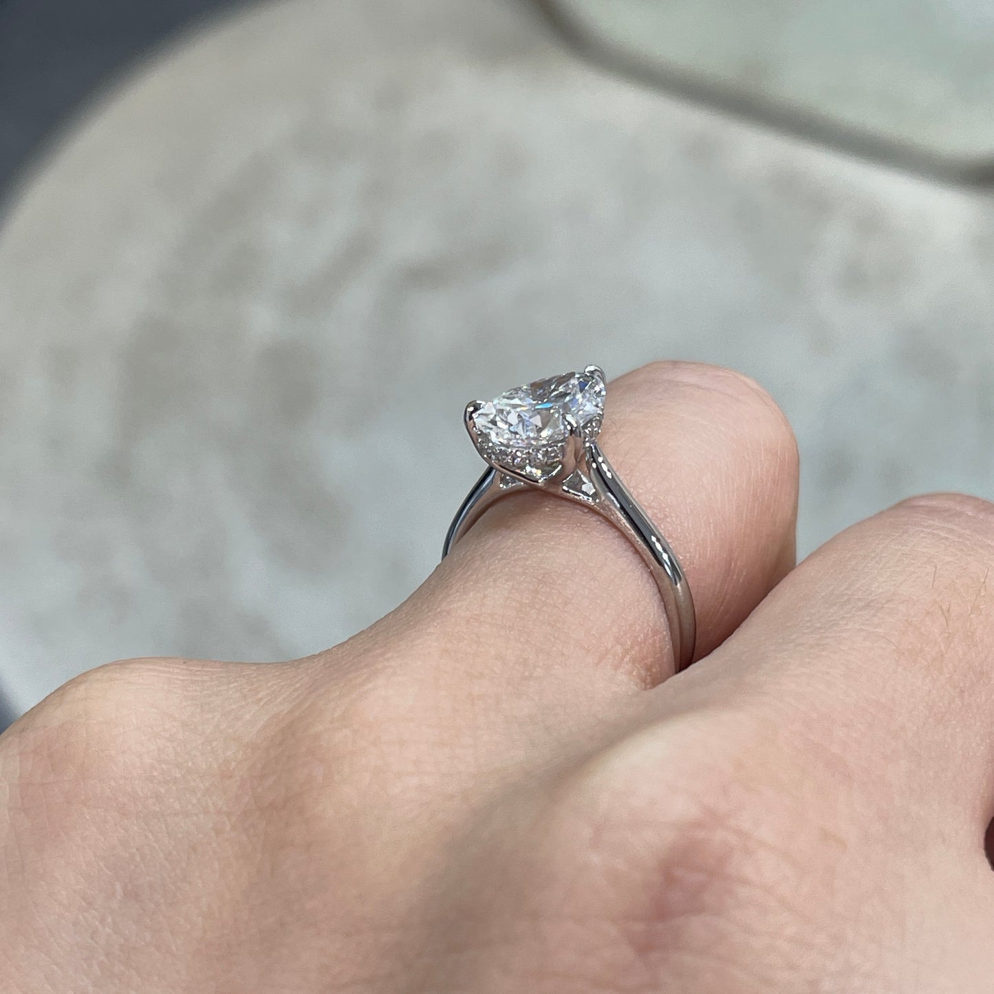 IGI Lab diamond pear shape 2.27ct three-prong underhalo ring