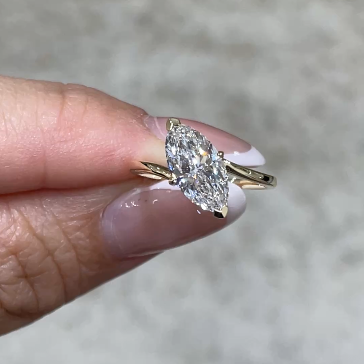 9k IGI lab diamond marqusie shape 1.5ct Twist band ring