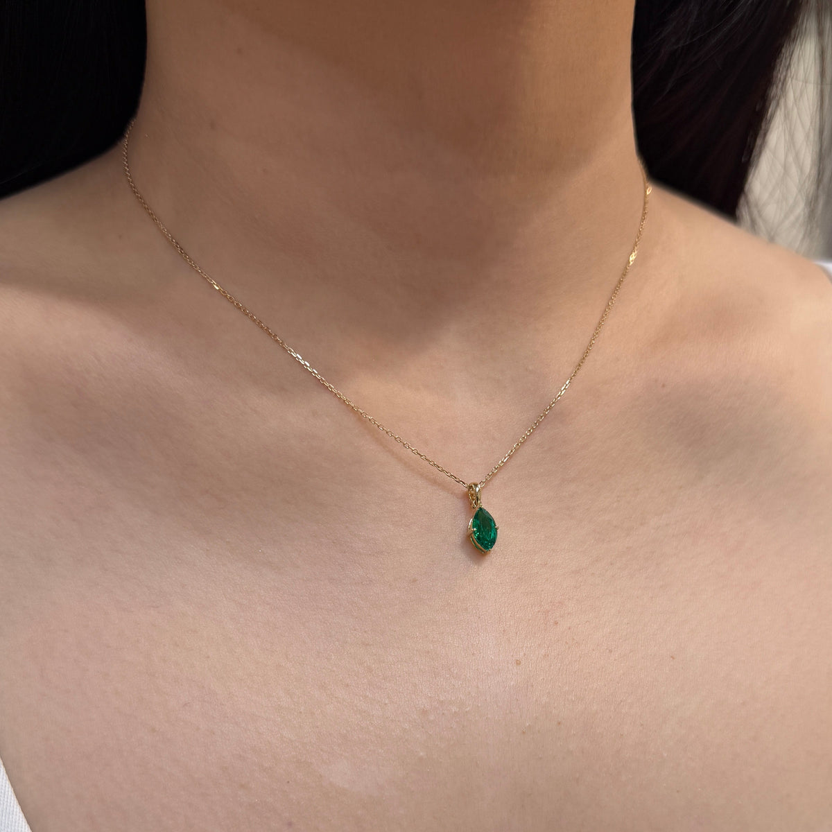 9k Lab emerald green marquise  shape 0.84ct open clip pendant