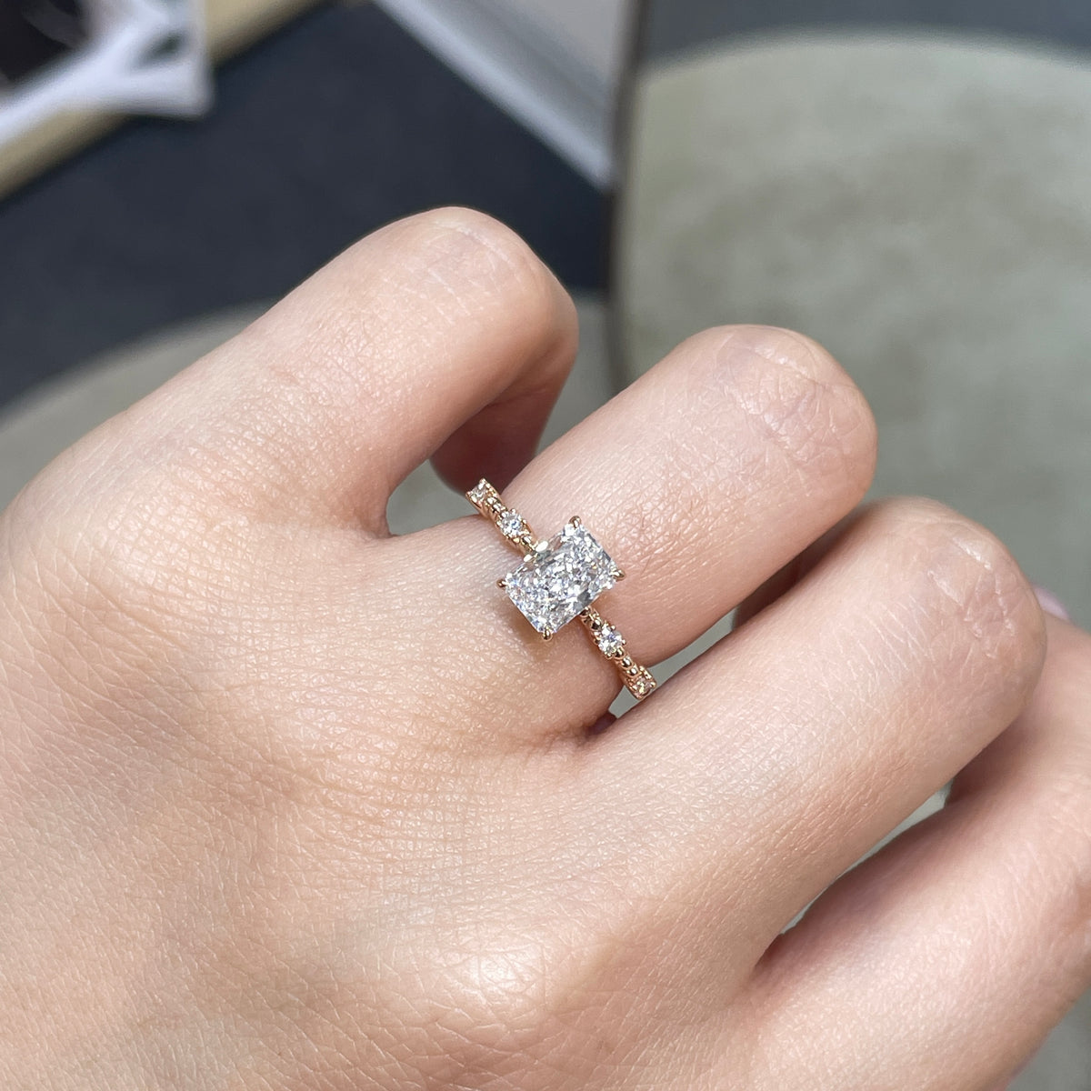 Lab Diamond radiant cut 1ct four-prong side stone with milgrain band ring