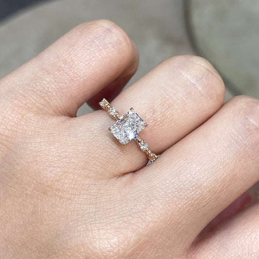 Lab Diamond radiant cut 1ct four-prong side stone with milgrain band ring