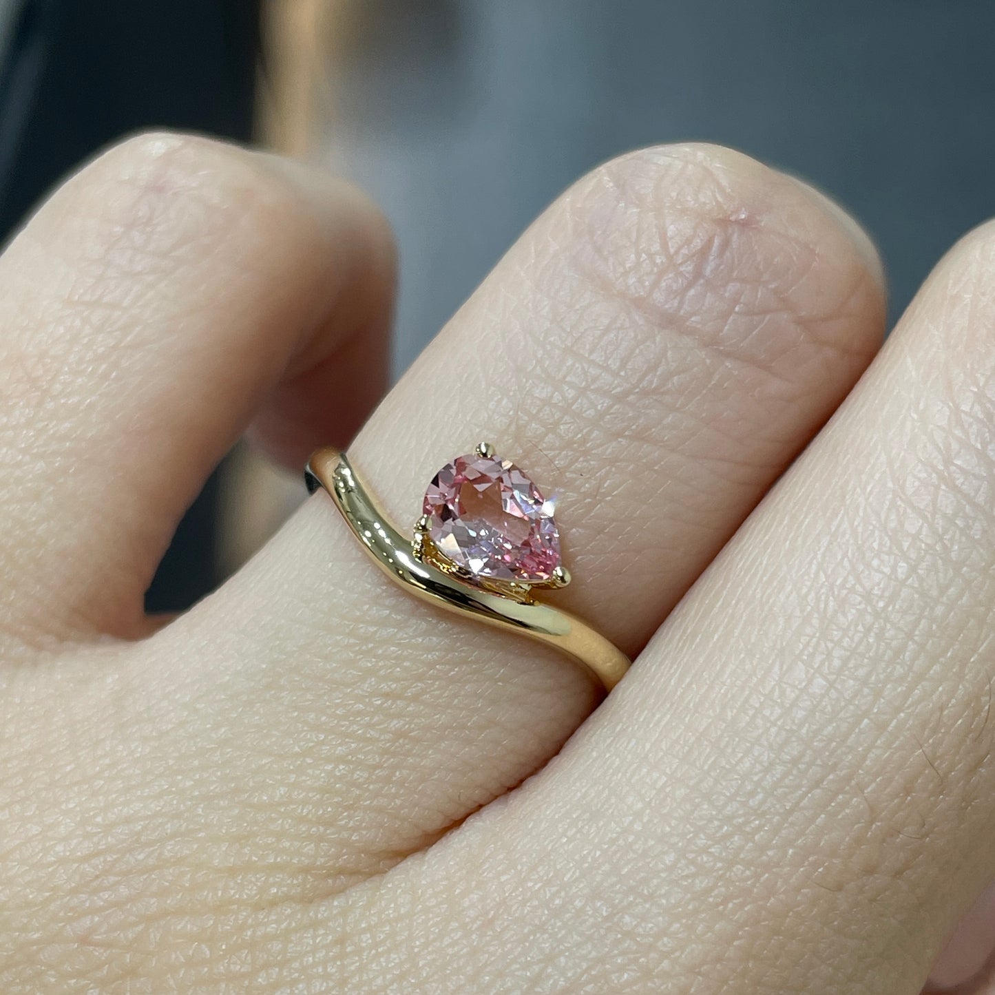 Lab pink sapphire pear shape 0.7ct wavy ring