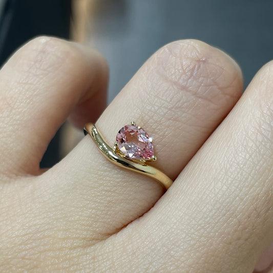 Lab pink sapphire pear shape 0.7ct wavy ring