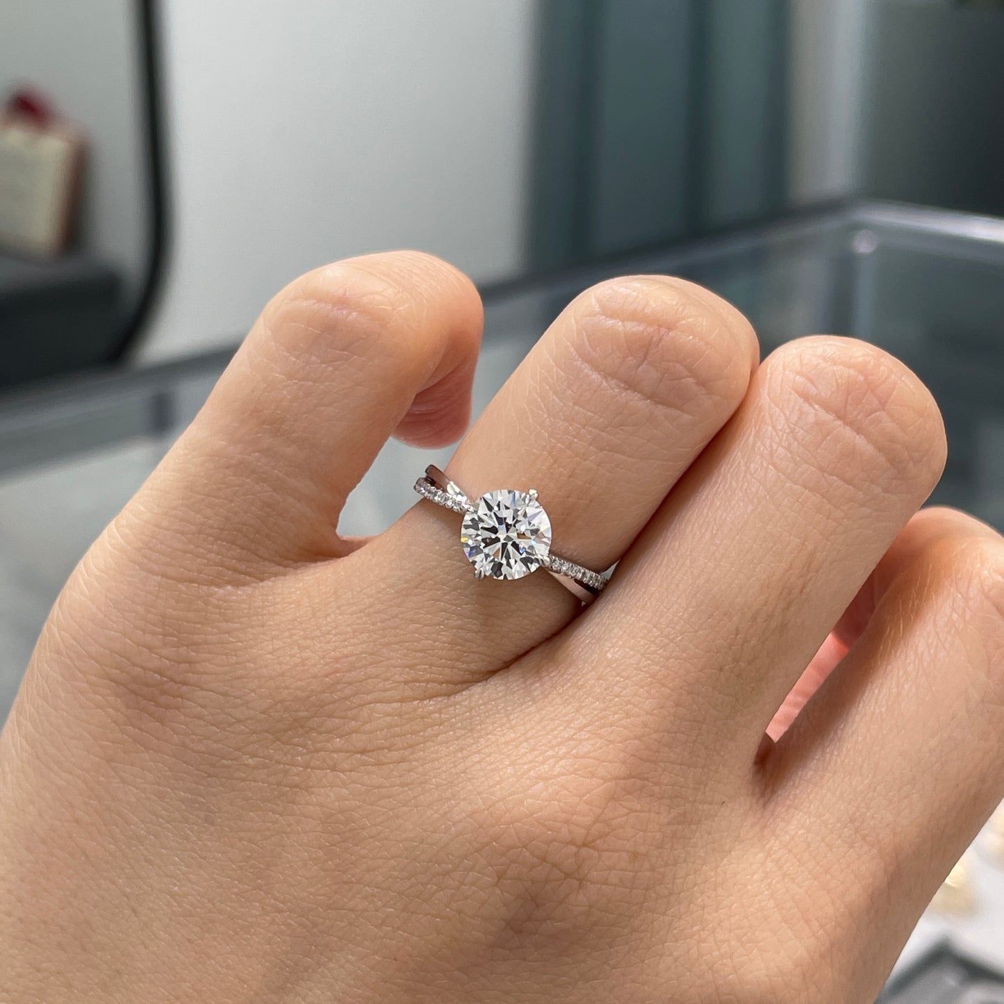 IGI Lab diamond Round 1.5ct compass four-prong underhalo criss cross pave band ring