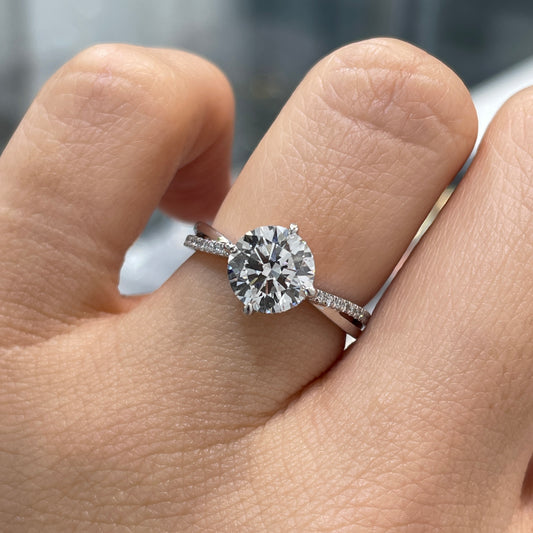 IGI Lab diamond Round 1.5ct compass four-prong underhalo criss cross pave band ring