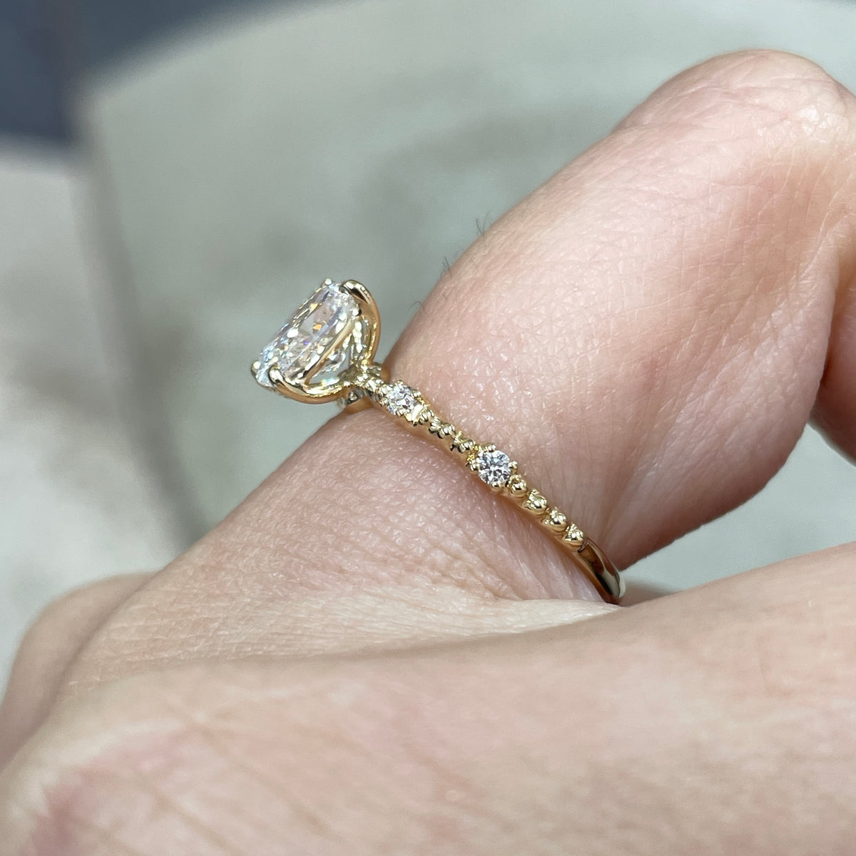 IGI Lab Diamond long cushion 1ct four-prong side stone with milgrain band ring