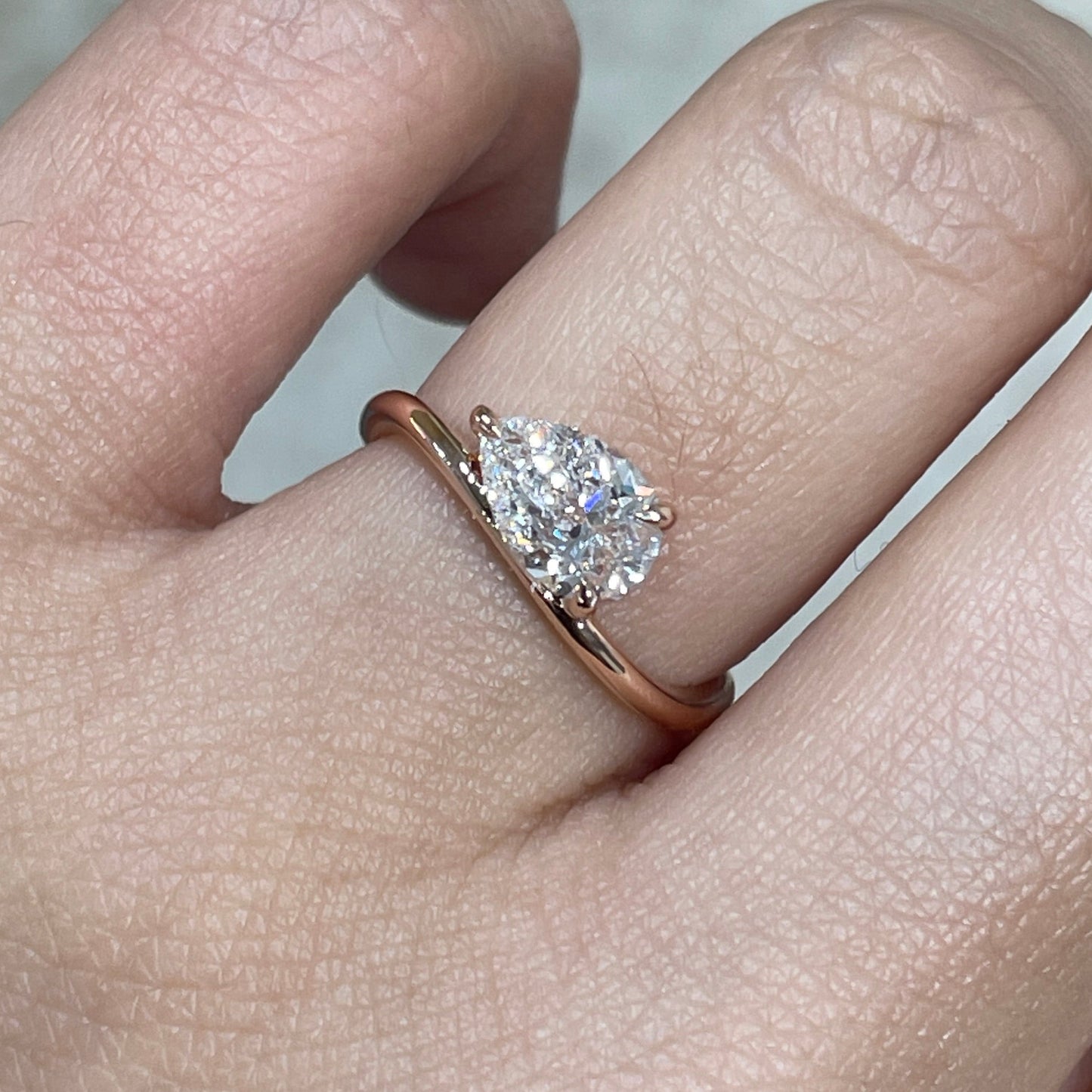 Lab diamond Pear shape 1ct three-prong wavy ring