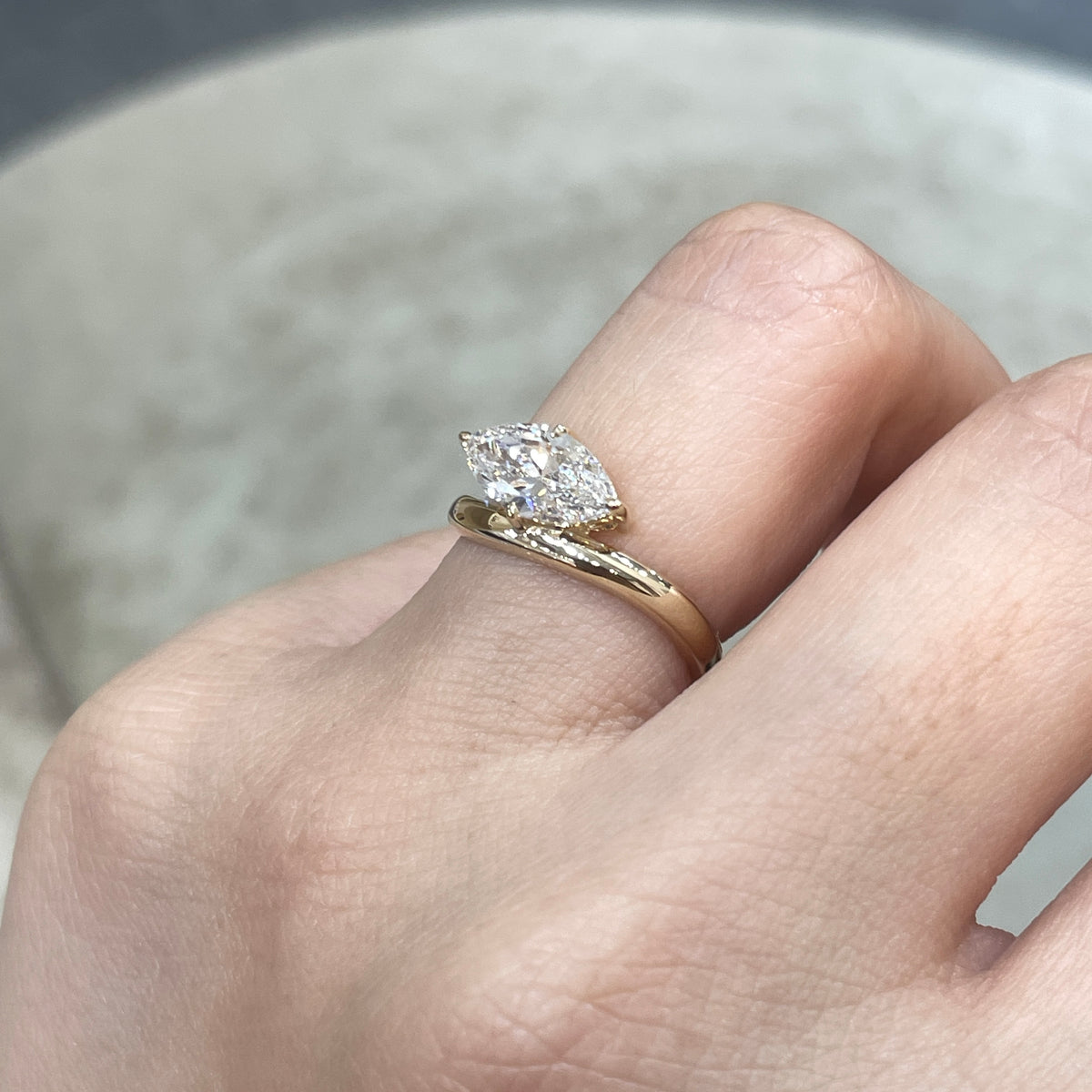 9k IGI Lab diamond marquise shape 1.2ct compass four-prong wavy ring