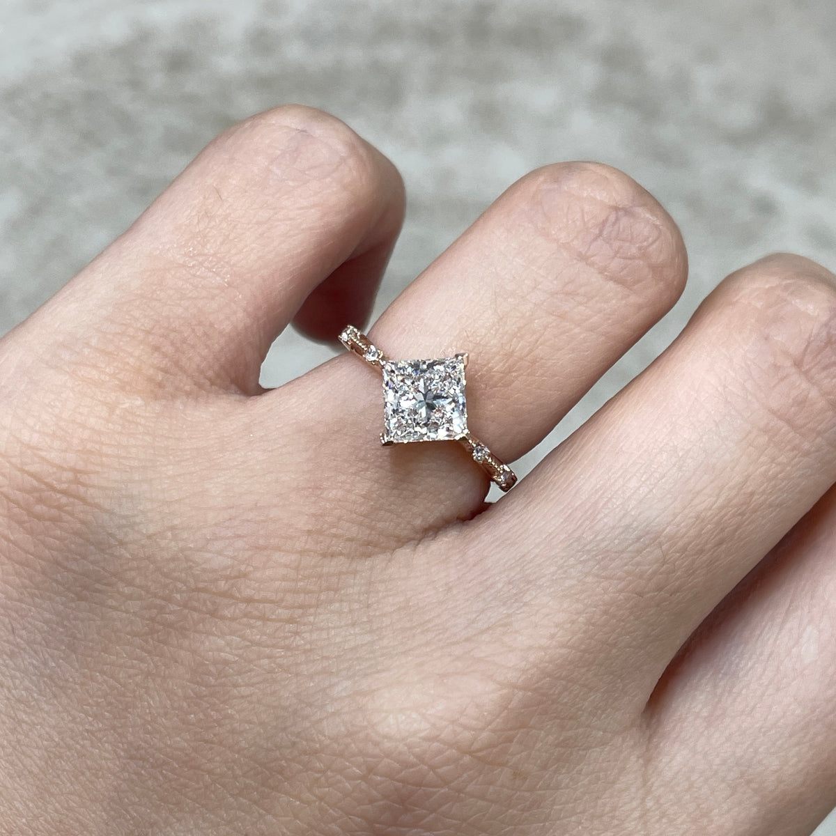 IGI Lab diamond Princess cut 1.5ct four-prong milgrain side stone band ring