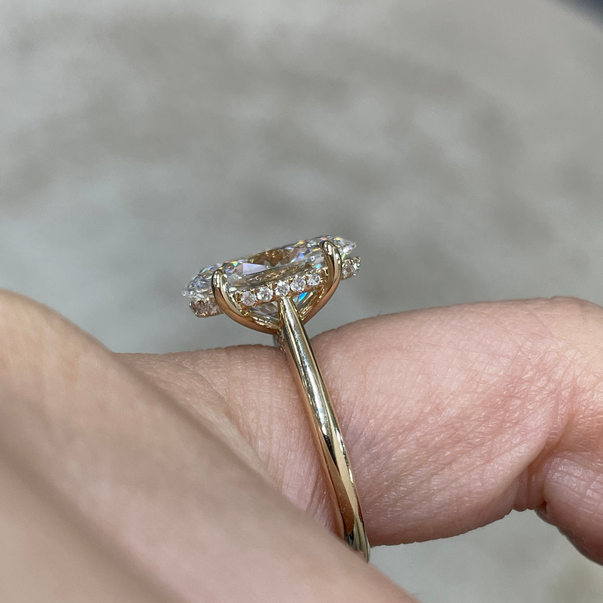 IGI Lab diamond Oval 3.5ct four-prong underhalo ring