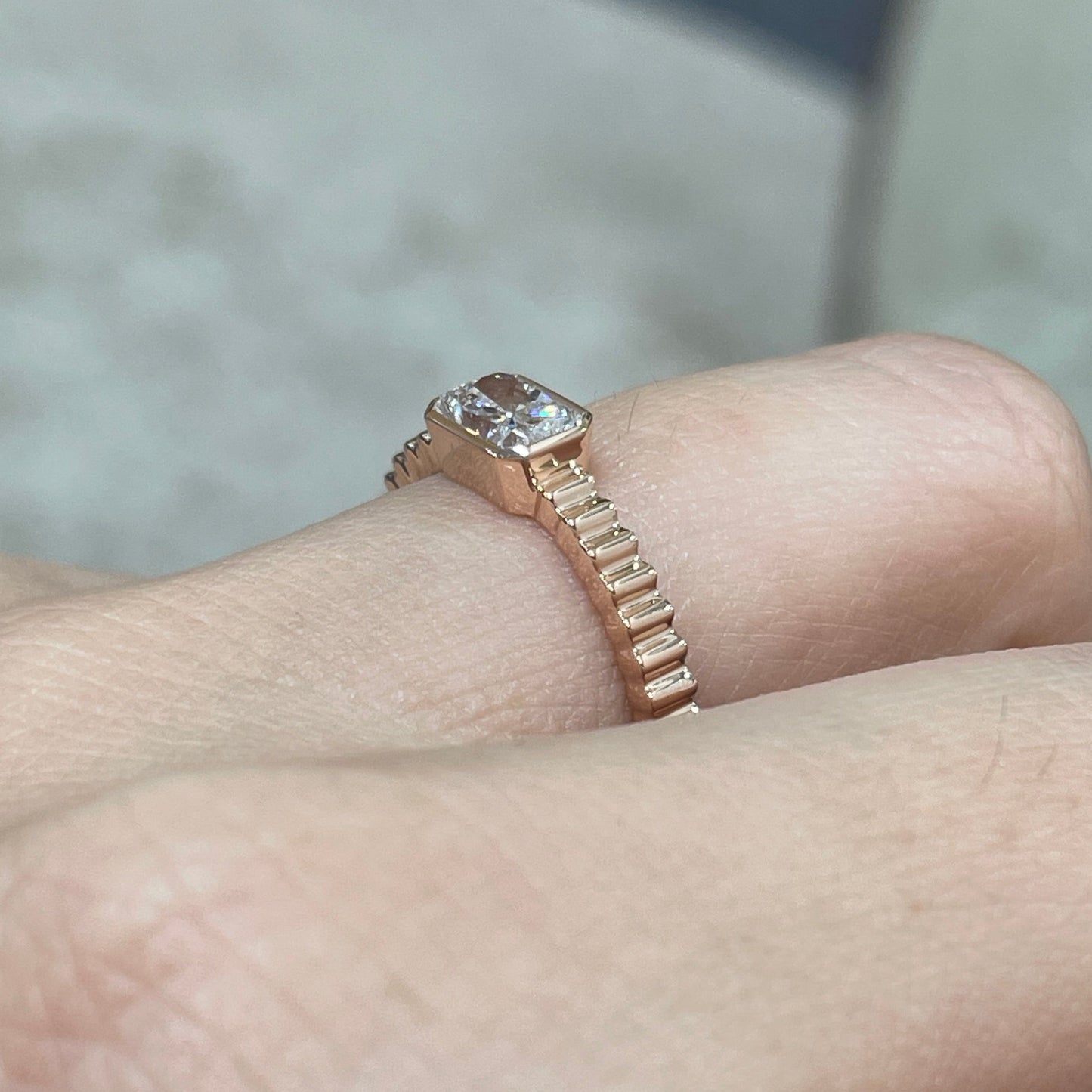 9k Lab diamond Radiant cut 0.6ct horizontal bezel set with vertical line band ring