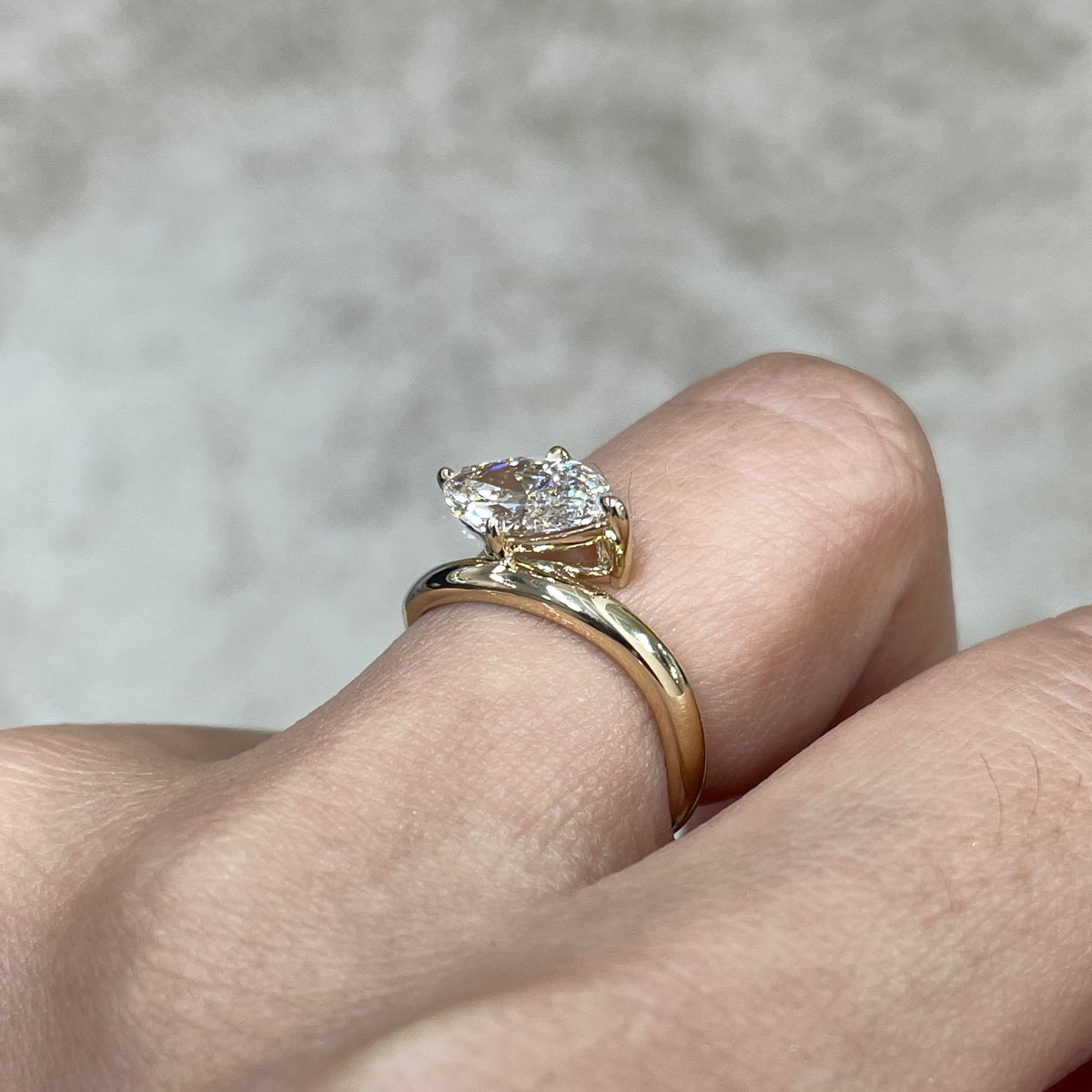 9k IGI Lab diamond marquise shape 1.35ct compass four-prong wavy ring