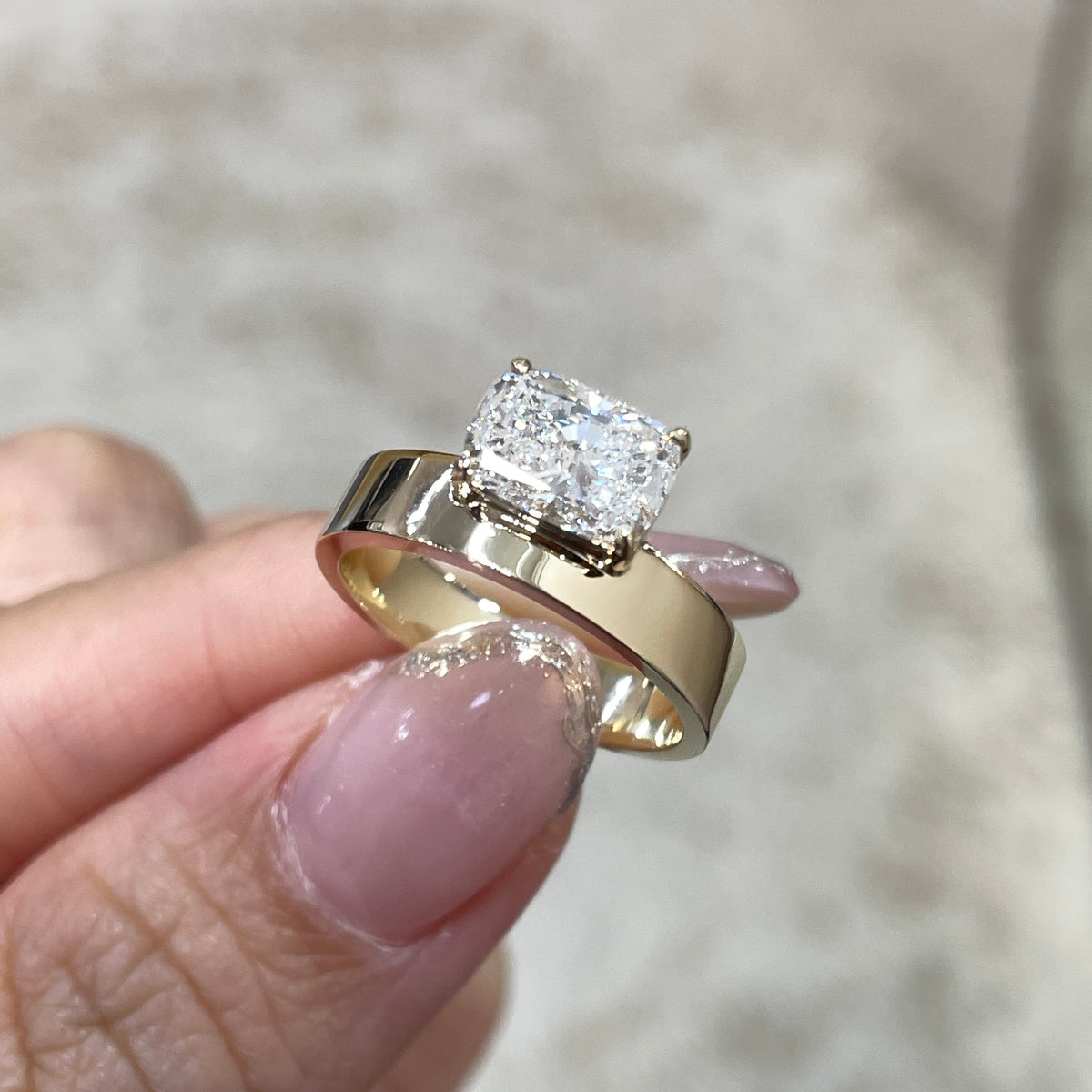 IGI Lab diamond long cushion shape 1.5ct four-prong horizontal top setting thick flat band ring